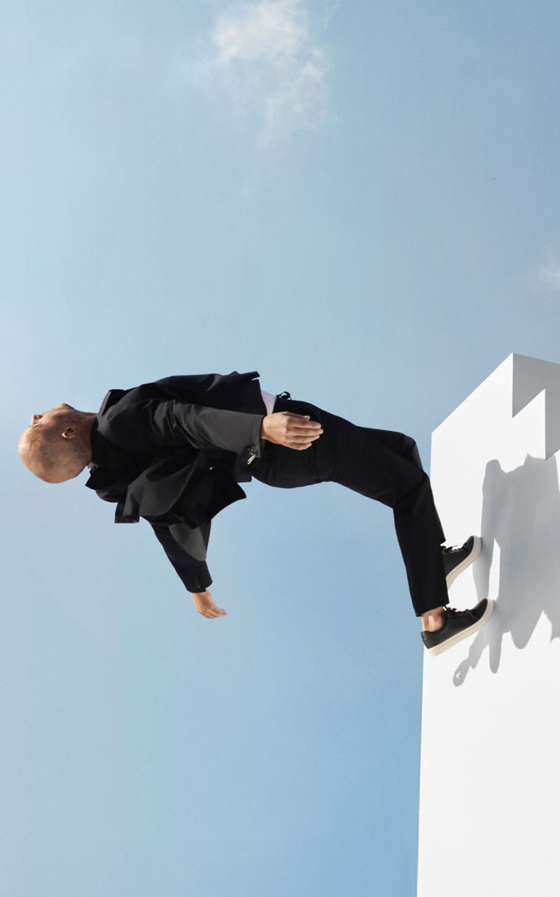 male model wearing BOSS Performance lightweight suit