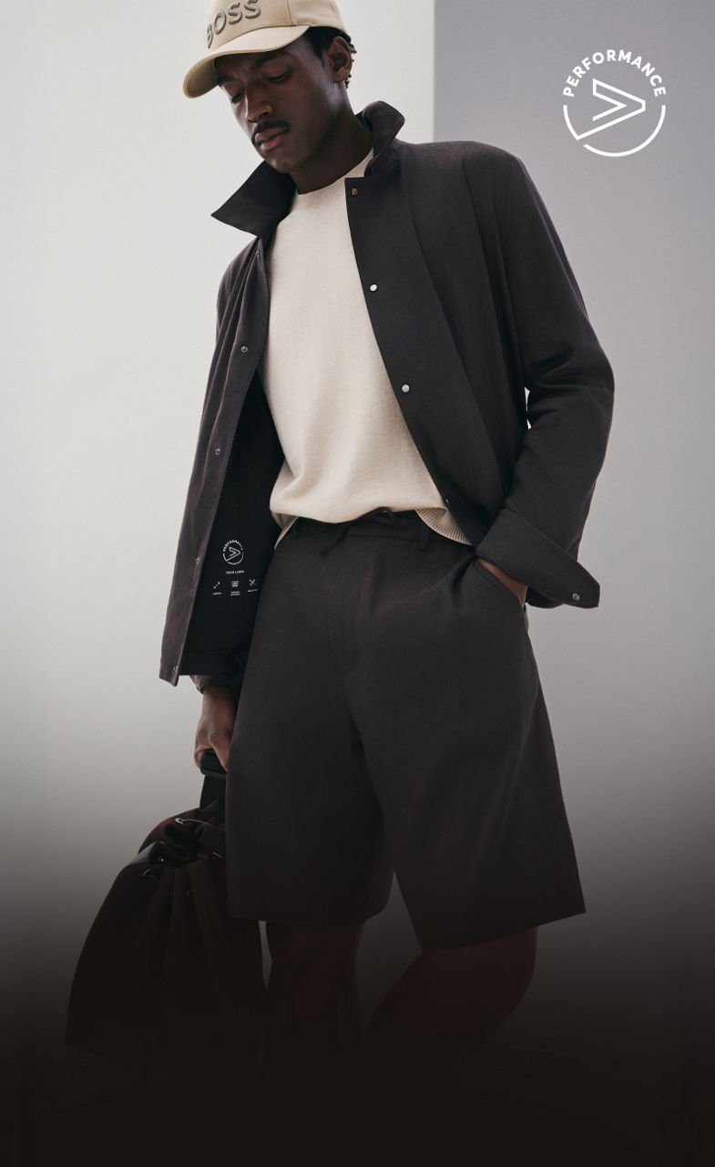 male model in the new BOSS Performance Tech Linen Look with a baseball cap
