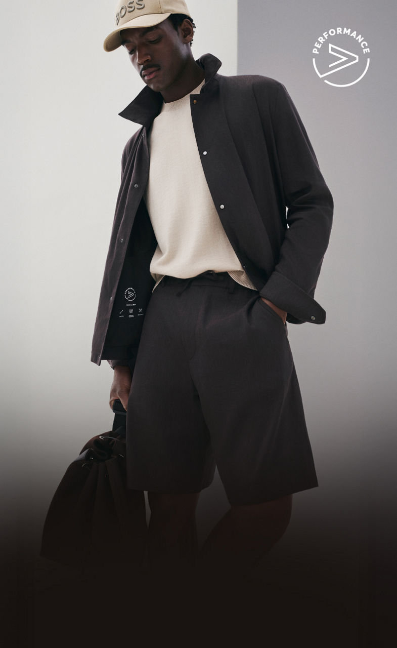 male model in the new BOSS Performance Tech Linen Look with a baseball cap