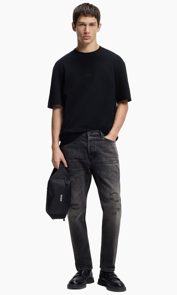 Shop HUGO BOSS tapered fit jeans