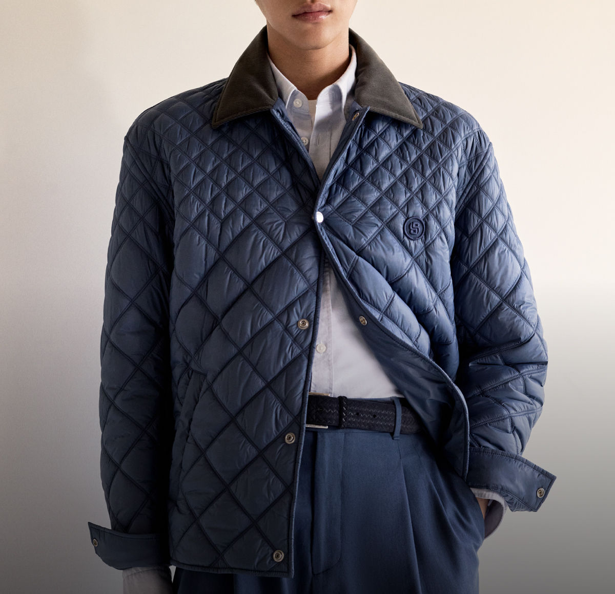male model presenting men´s knitwear of the new BOSS Global Campaign collection