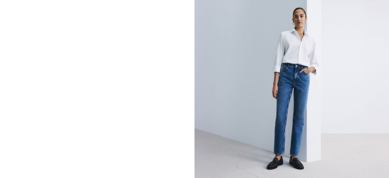 Model wearing a pair of straight fit jeans 