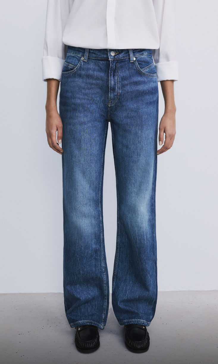 model wearing mom fit denim 