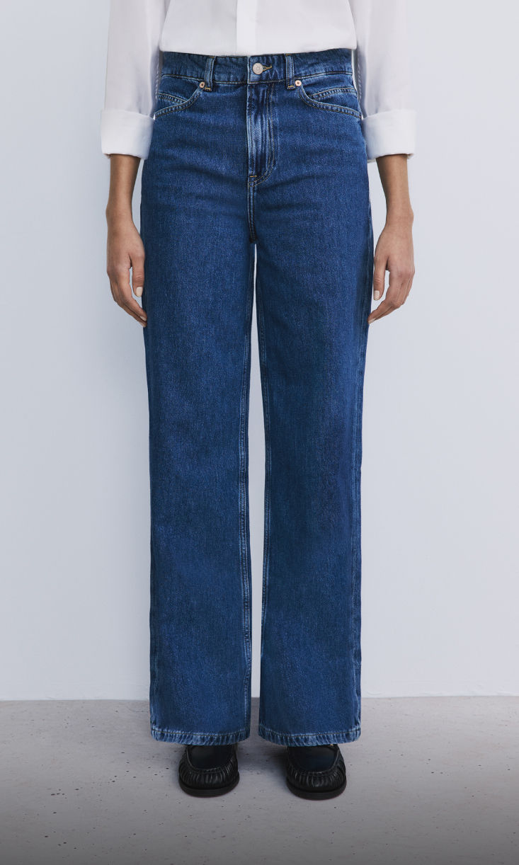 model wearing wide fit denim 
