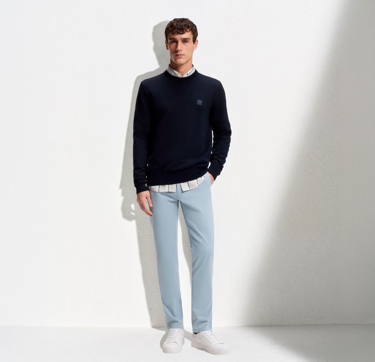 Selection of different colours of chinos for men by BOSS