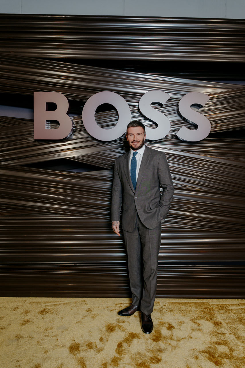 David Beckham attending the BOSS fashion show in a full look from the BOSS by Beckham SU26 collection