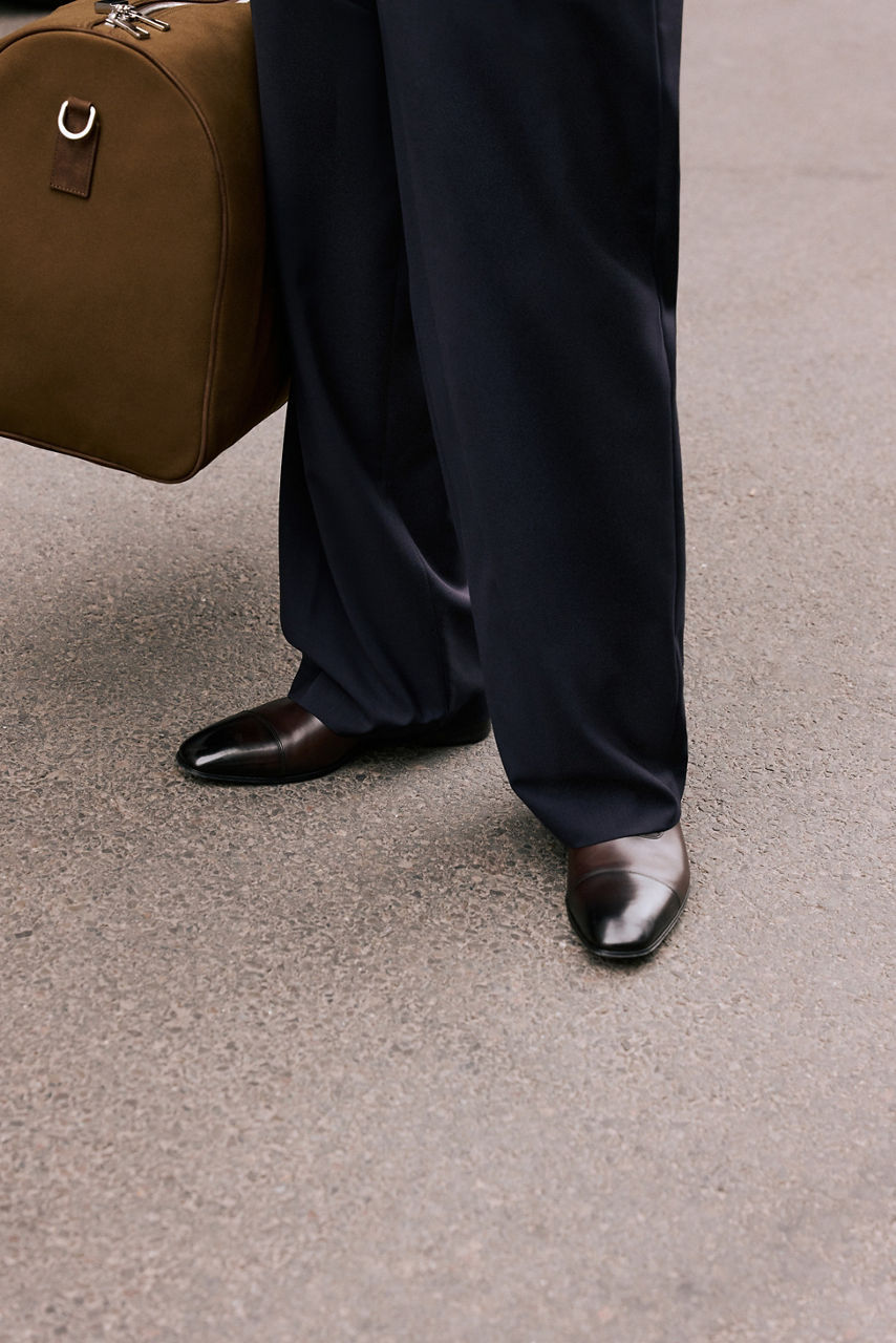 Influenceur portant une tenue de la collection BOSS BY BECKHAM