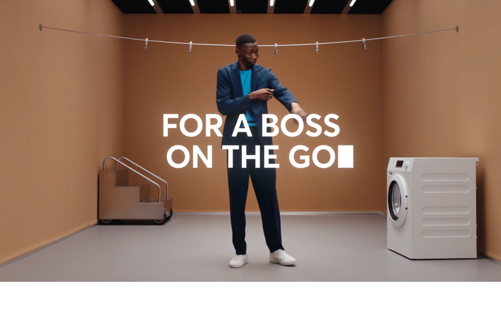 Video of Khaby presenting the new dressletic suit featuring the washable and wrinkle free function of the suit 