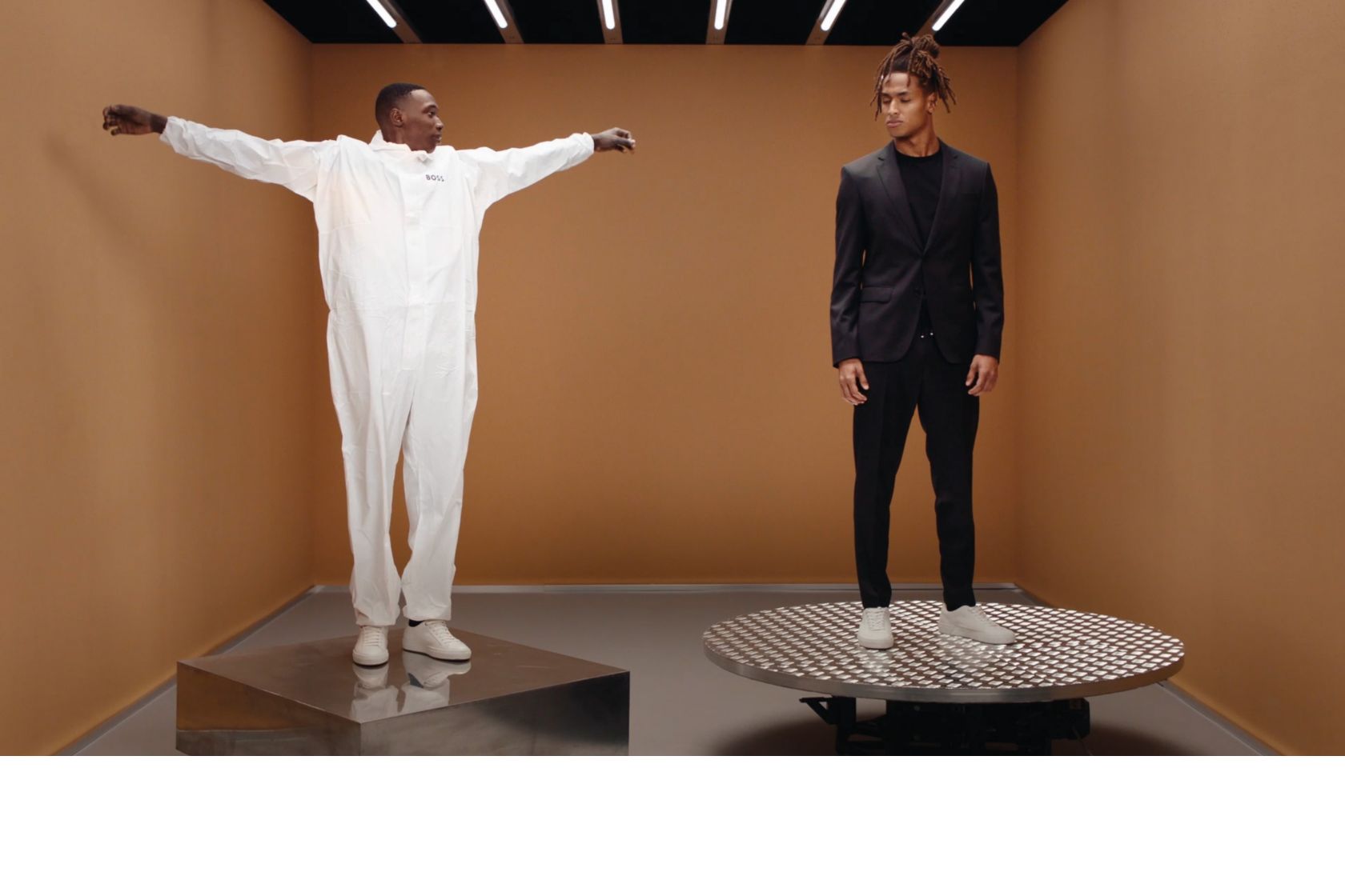 Video of Khaby presenting the new BOSS one suit featuring the four way stretch fabric 