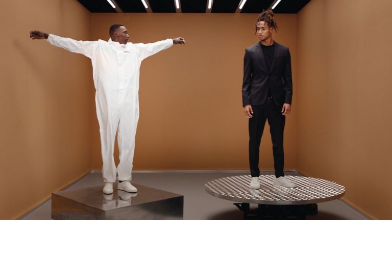 Video of Khaby presenting the new BOSS one suit featuring the four way stretch fabric 