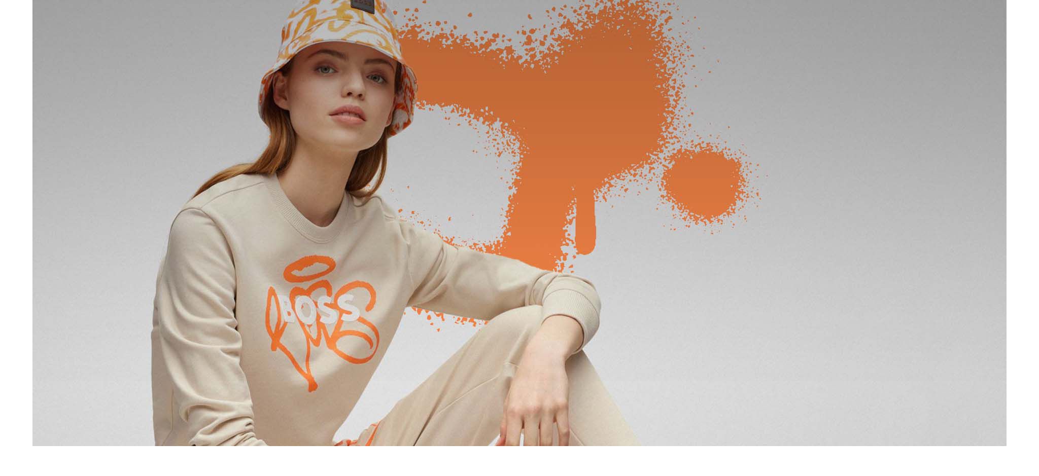 BOSS Limited Edition Graffiti collection graffiti printed beige and orange sweater