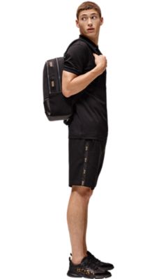 Black jacket trousers and shoes with red T-shirt for men by BOSS  