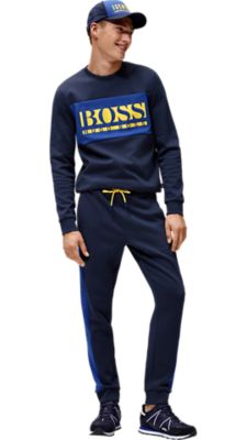 Black jacket trousers and shoes with red T-shirt for men by BOSS  