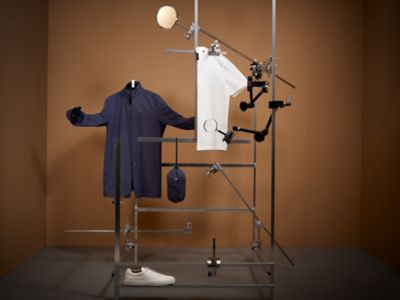 Laydown Image of packable blue coat 