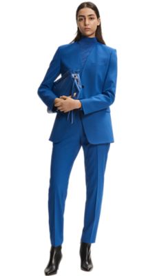 blue slacks black shoes