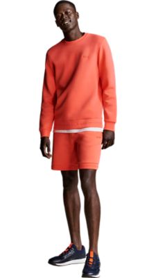 orange jersey shorts with a white t-shirt and a orange sweatshirt overneath for men by BOSS