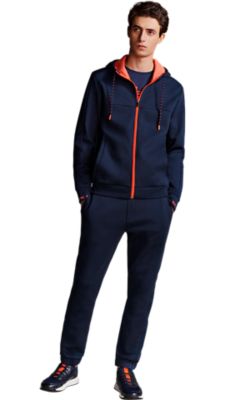 Dark blue jersey trouser with a dark blue T-shirt and a dark blue hooded zipper jacket with orange details for Men by BOSS