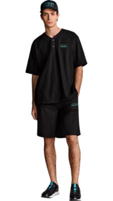 black jersey shorts with a black poloshirt without a collar and a black cap for Men by BOSS