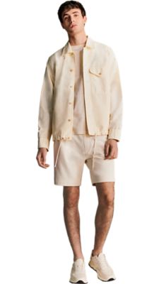 light beige jersey shorts with a light beige t-shirt and a light beige short jacket for men by BOSS