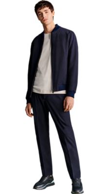 dark blue trouser with a open white t-shirt and a dark blue bomber jacket for men by BOSS