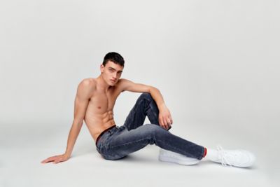 Female model is wearing a denim by HUGO