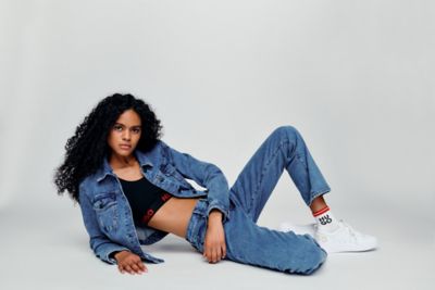 Female model is wearing full denim look