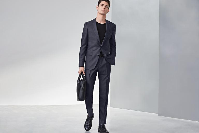 suit with black sneakers