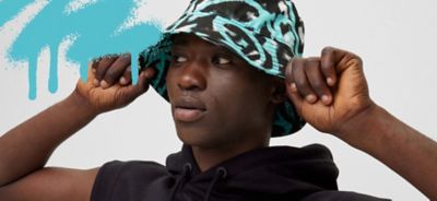 BOSS Limited Edition Graffiti collection green letters with white background