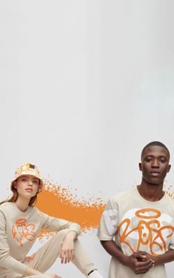 Figures wearing BOSS Limited Edition Graffiti collection and spraying on the screen