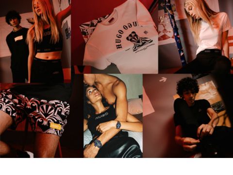 Men in a black suit and women in an orange dress from HUGO