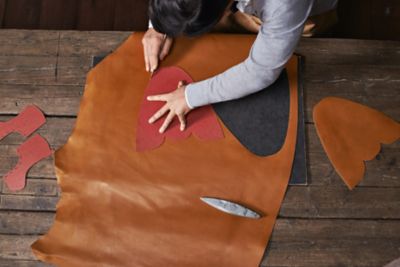 Cutting leather fabric by BOSS